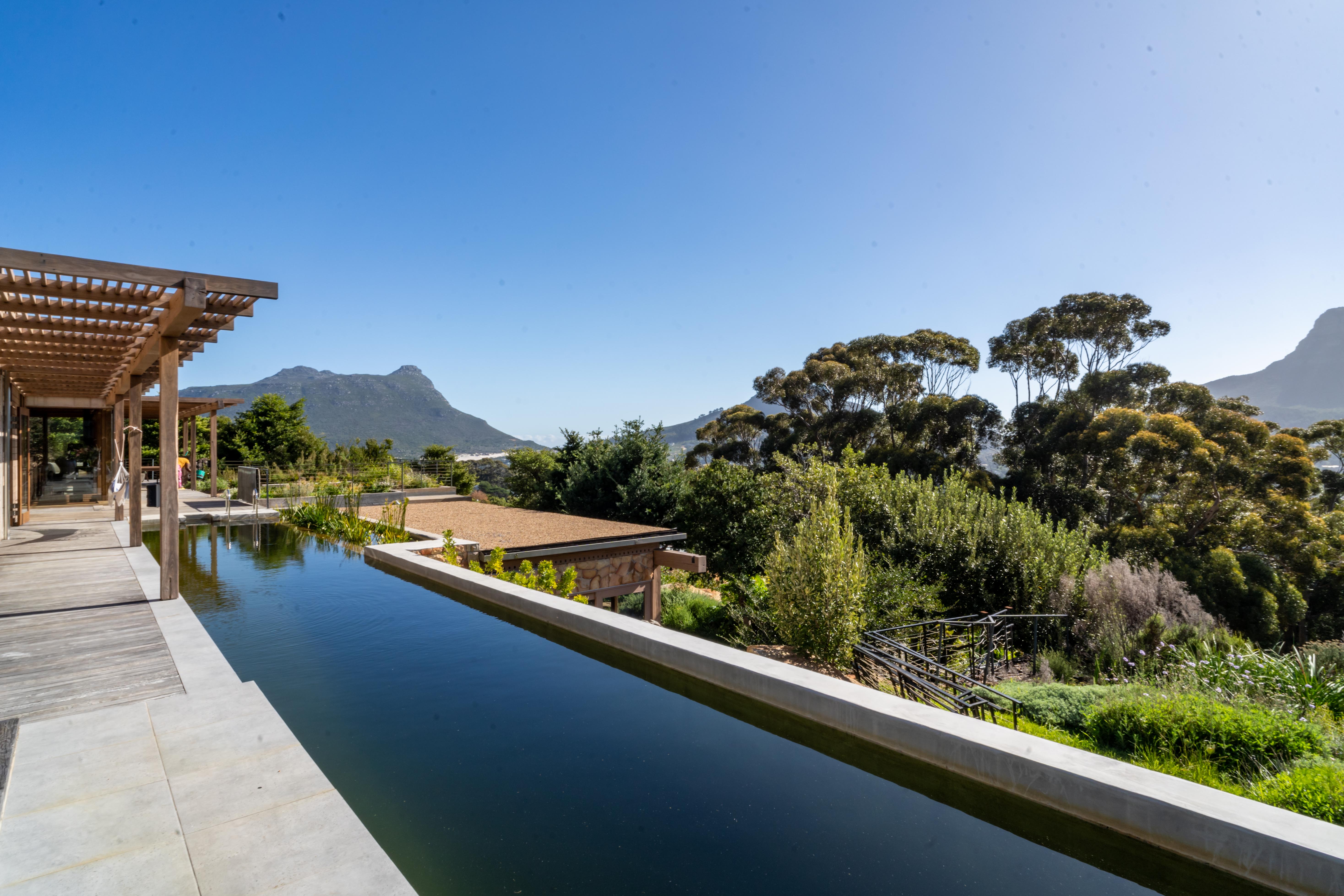 The infinity edge of the 20-metre biofiltration lap pool, looking out at the Hout Bay valley